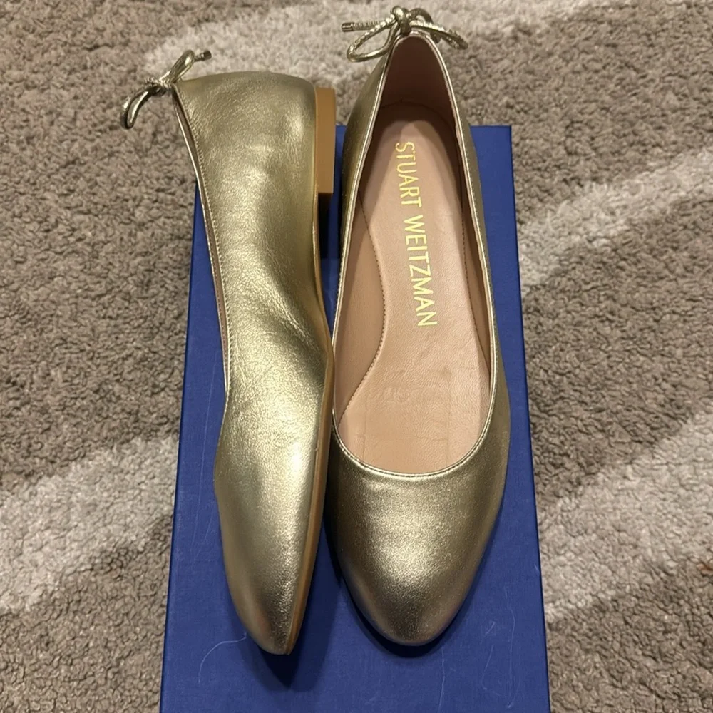 Stuart weitzman, tieback flat gold color, US 9